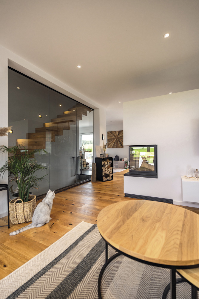 8 Nouvelle construction d’une maison unifamiliale - Séjour avec escalier et cheminée 8 Nouvelle construction d’une maison unifamiliale - Séjour avec escalier et cheminée